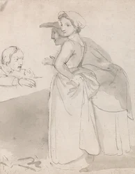 Deux femmes parlant à un homme à un comptoir